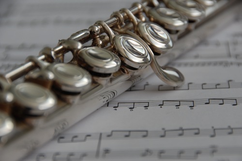 sheet music and flute